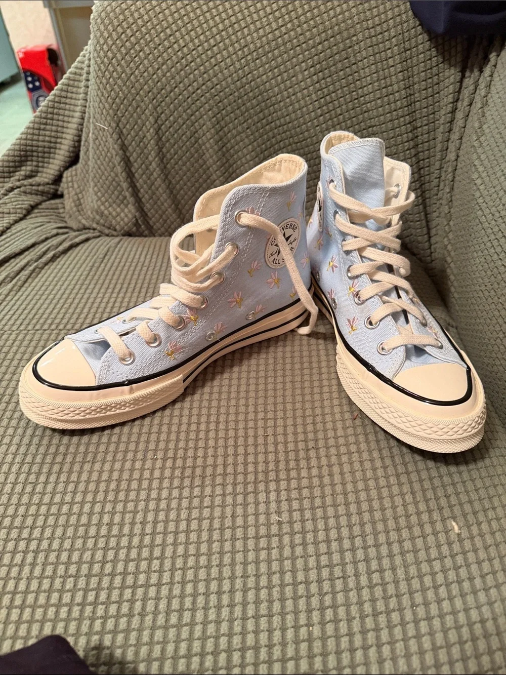 Converse Chuck Taylor light blue with purple flowers.   Mens 4. Womens 6